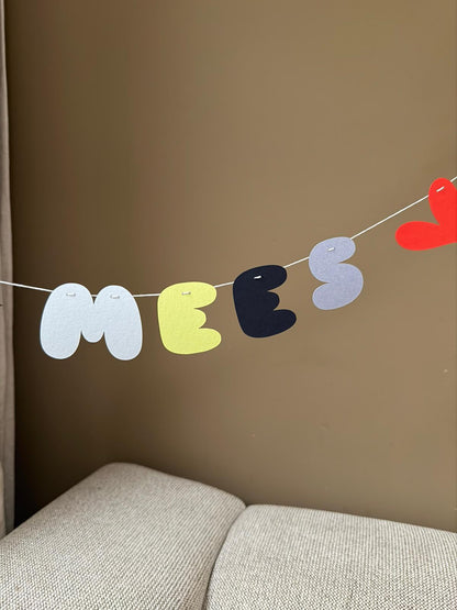 Naamslinger Mees